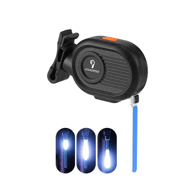Bicycle taillight displaying a blue waterfall or running water light effect on a dark background.