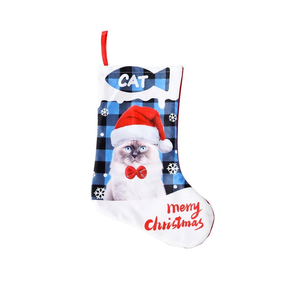 Printed cloth Christmas decoration with puppy or cat design in plaid colours measuring 26x36cm