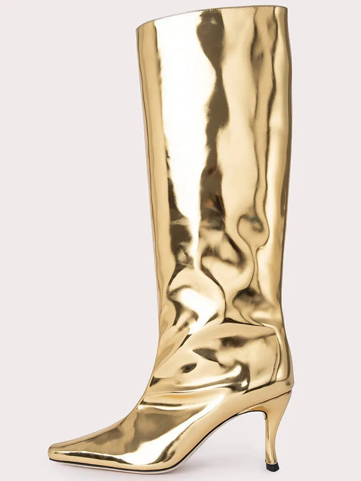 Women's black square toe cowboy boot with microfiber upper on a wooden background.