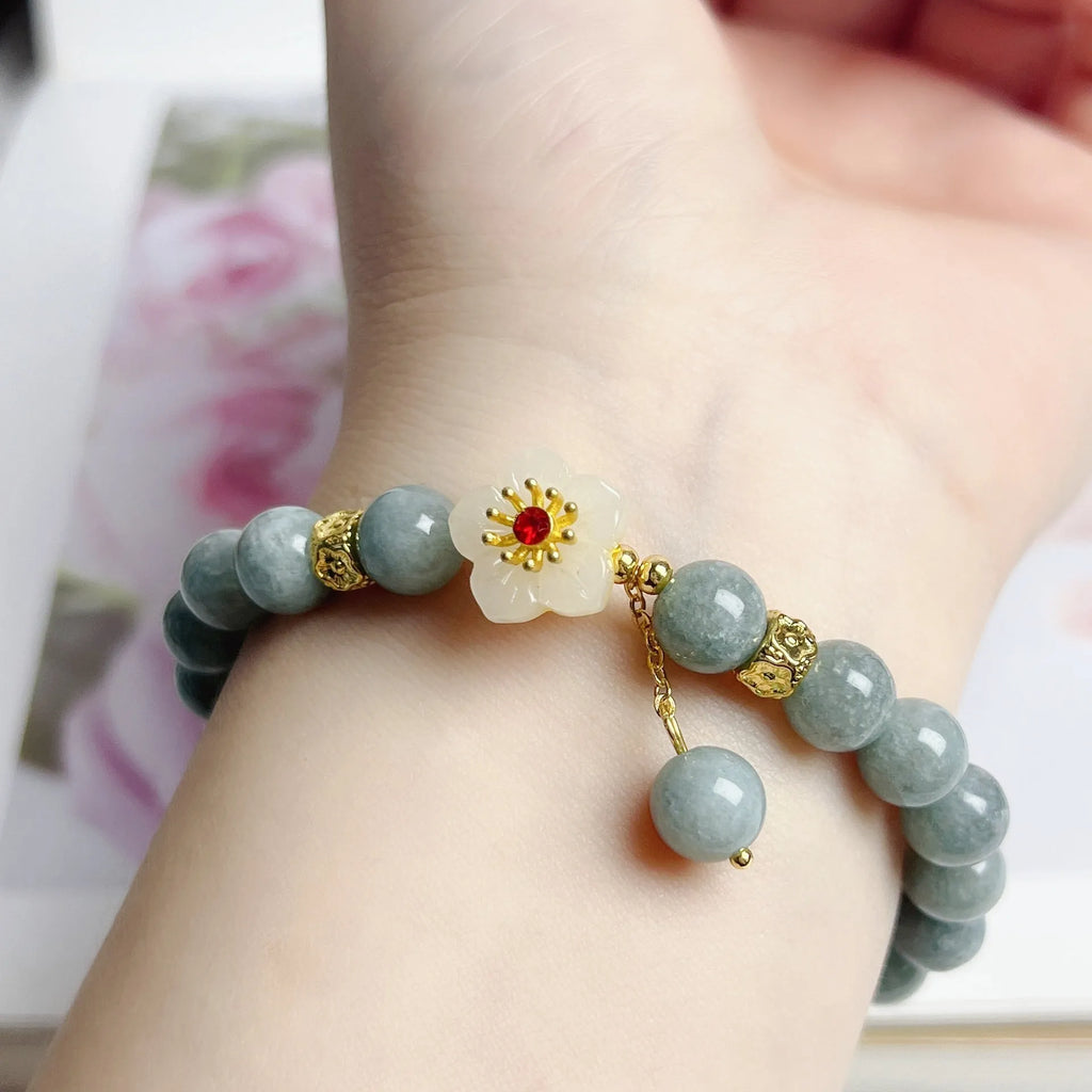 Women's adjustable jade bracelet with retro style and rope closure on wrist