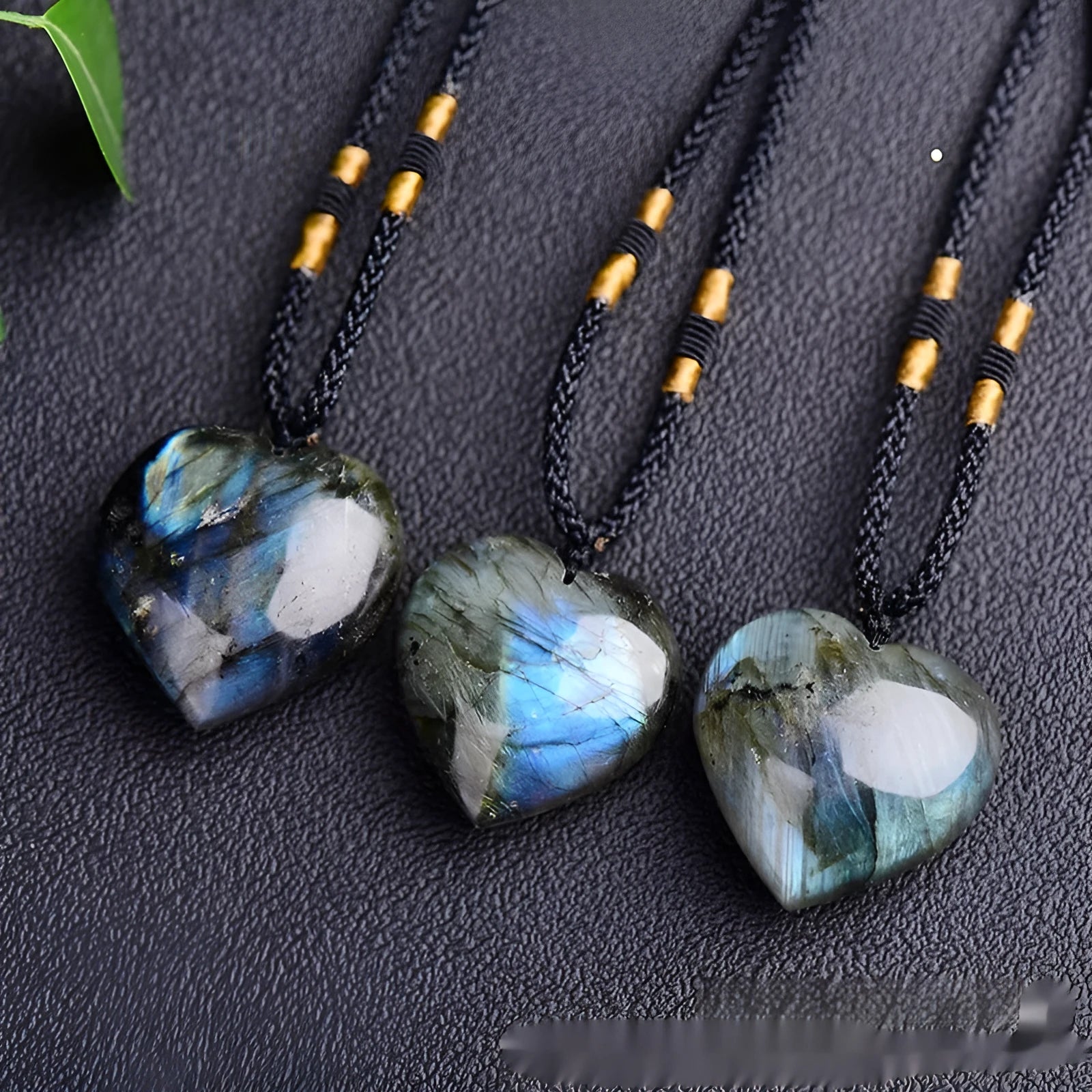 Blue light labradorite moonstone Heart of the Ocean geometric crystal necklace on a chain.