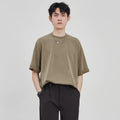 Men's loose drape knit casual T-shirt in solid colours brown, white, and black.