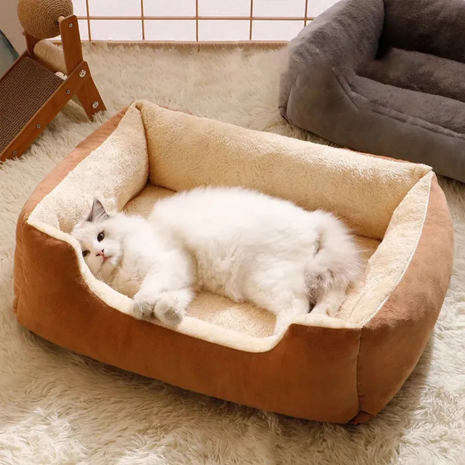 Soft plush cat bed cushion shown in grey, available in five sizes from small to extra extra large.