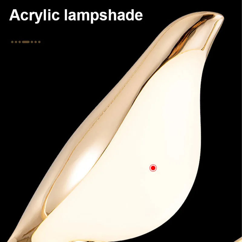Modern minimalist magpie bird shaped chandelier with zinc alloy and acrylic construction.