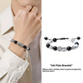 Hand-woven 999 sterling silver couple bracelet set with animal elements and tassel details