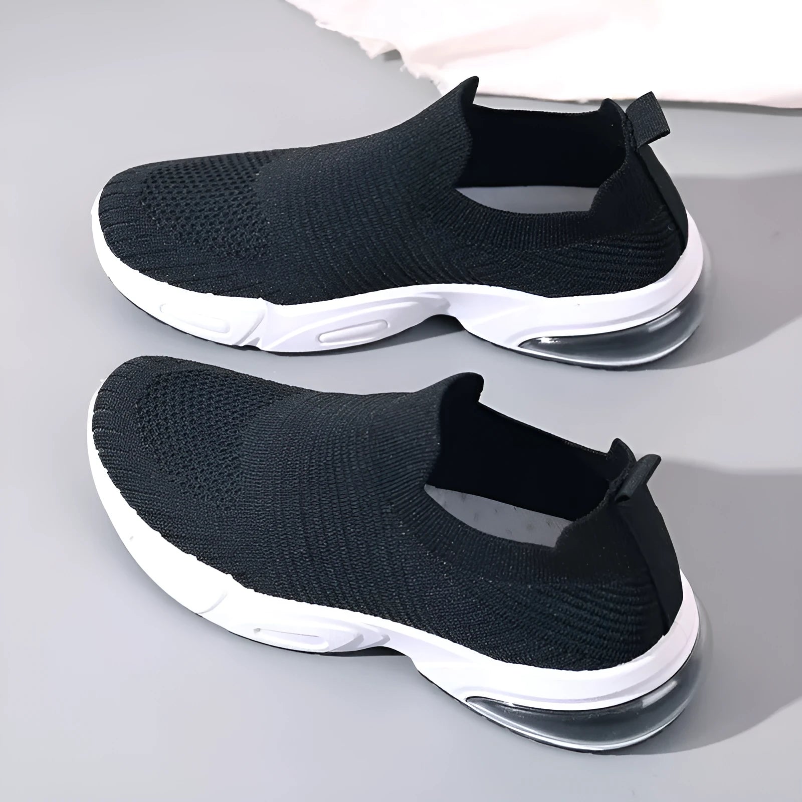 Breathable mesh slip-on sock shoes with a low-top design and PVC sole in various colours