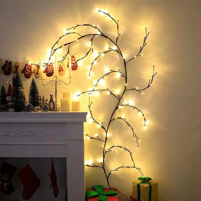 Flexible LED willow vine light garland with warm white bulbs shaped on a wall.