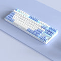 Wireless Bluetooth mechanical keyboard with a metal base in purple-white or blue-white colour options.