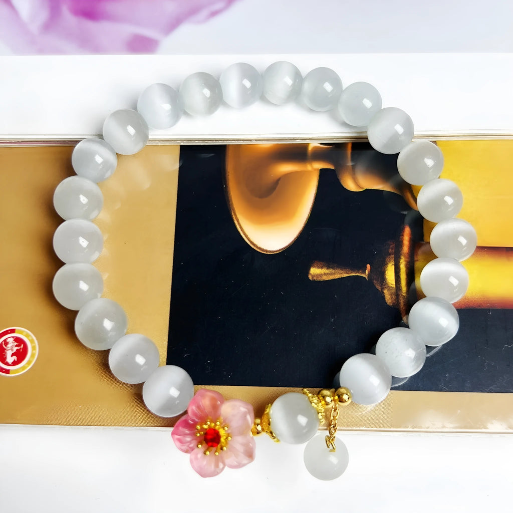 White opal flower beaded bracelet handmade from glass and coloured glaze jewellery