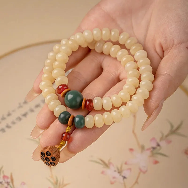 Wooden women's bracelet with milk butter bodhi beads in double ring design, beads measure 6x9mm