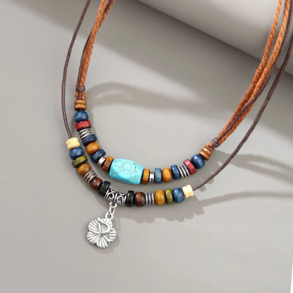 Men's wooden bead necklace with turquoise wax rope cord and alloy geometric floral pendant