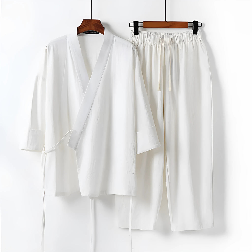 Women's apricot coloured cotton linen hanfu style cardigan and trousers two-piece suit.