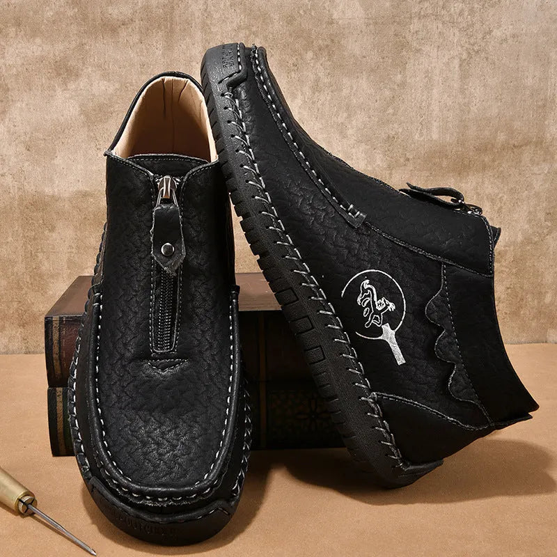 Men's black slip-on loafers with round toe and low flat rubber sole