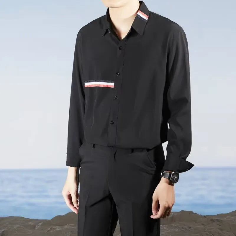 Hong Kong style loose fit shirt cardigan in a cotton blend fabric, shown in a light blue colour.