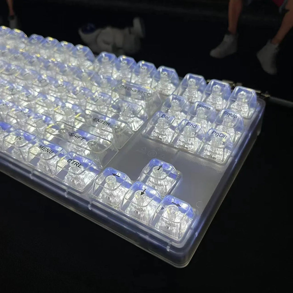 132 transparent plastic keycaps arranged as complete mechanical keyboard replacement set