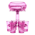 Transparent six-cup shot glass dispenser rack with gold-trimmed cups on a table.