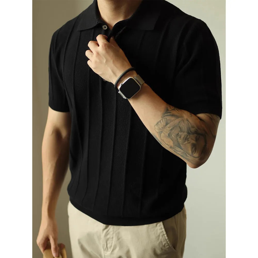 A man's loose-fit solid colour polyester pullover t-shirt on a hanger, shown in black and white colour options.