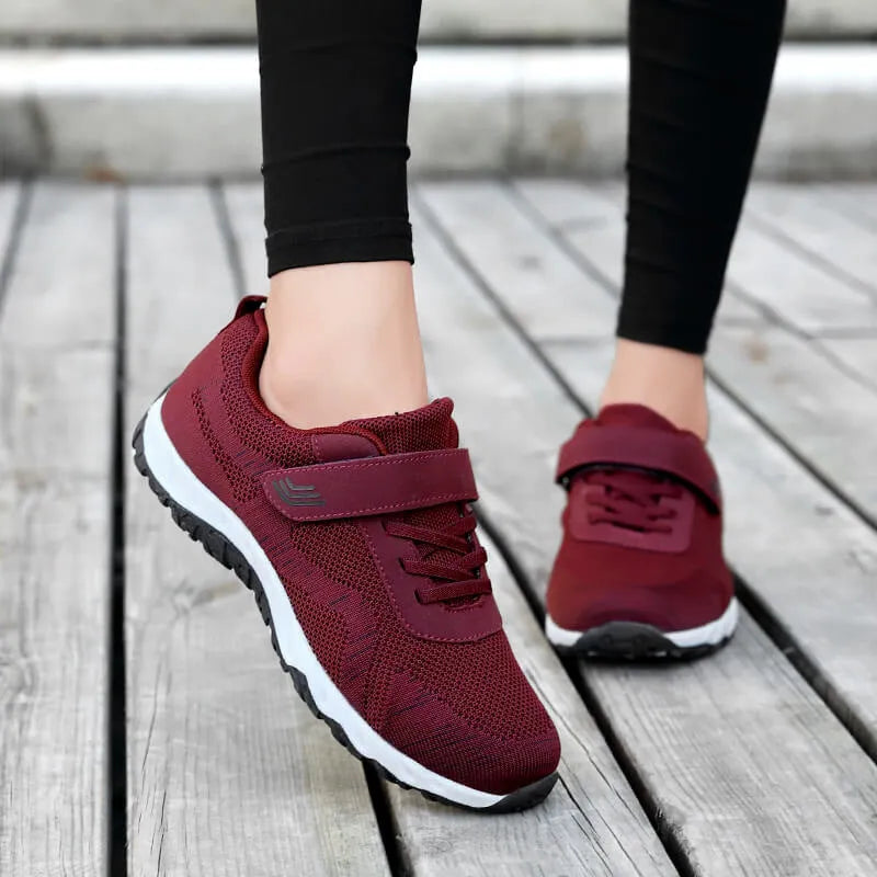 Women's low-top grey purple wedge shoes with Velcro strap and breathable mesh upper.