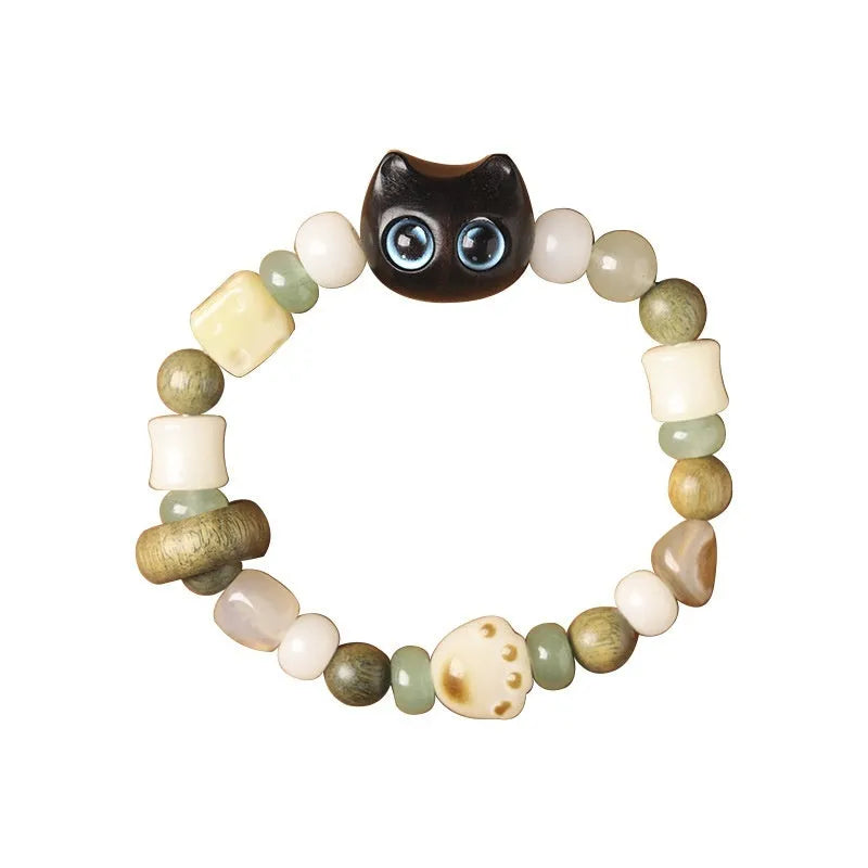 Hand-woven bracelet with jade guajacwood multi-treasure cube and cat's paw design in bodhi and ebony materials