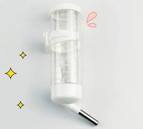 Green plastic ball kettle water feeder for small pets, shown attached to a cage.