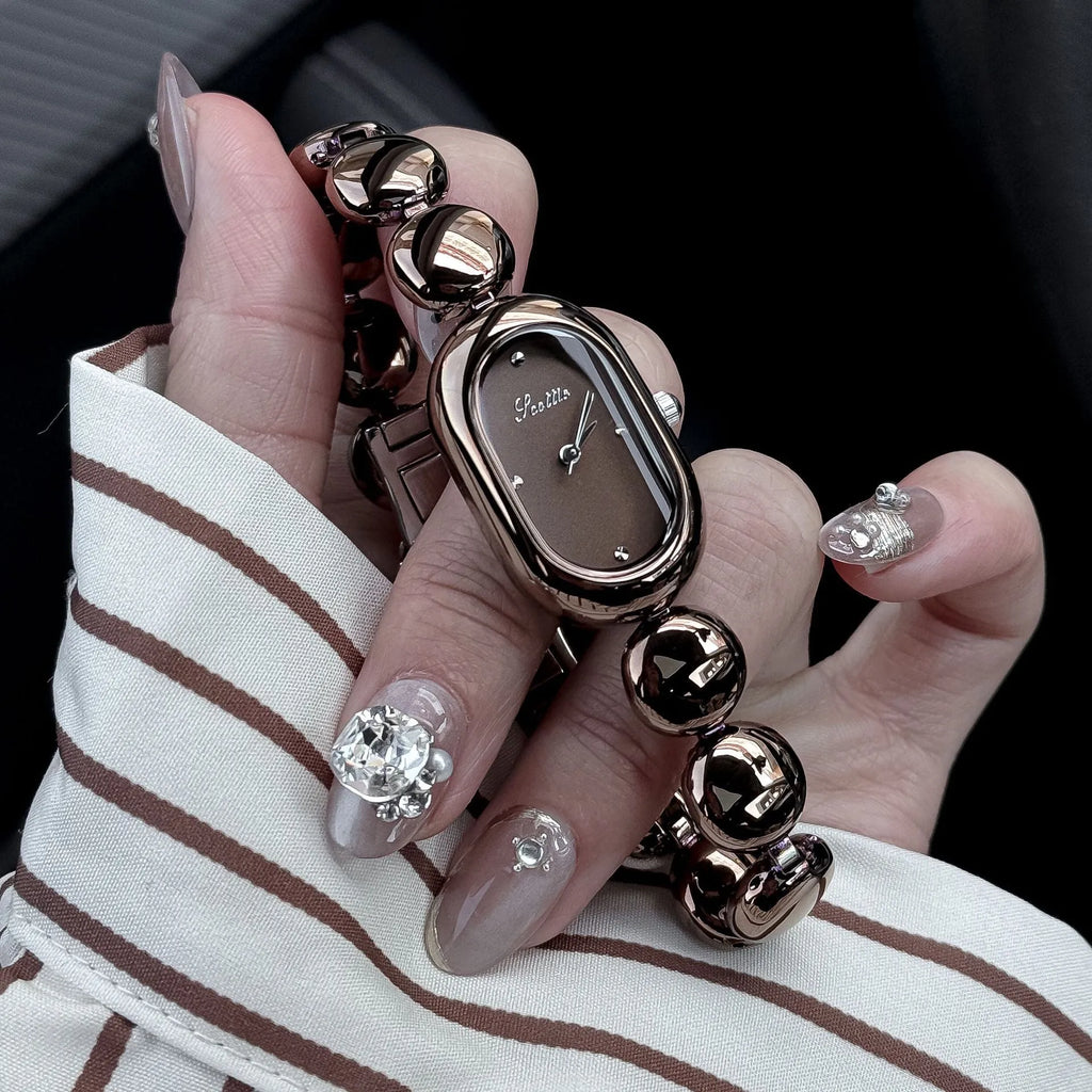 Women's oval gold fashion watch bracelet with 9mm thickness in seven colour options