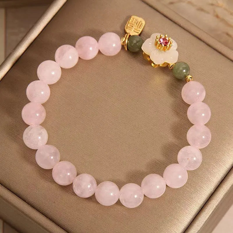 Women's crystal beaded bracelet with Hetian jade style beads, a fruit pendant, and camellia motifs in a blessing card colour.