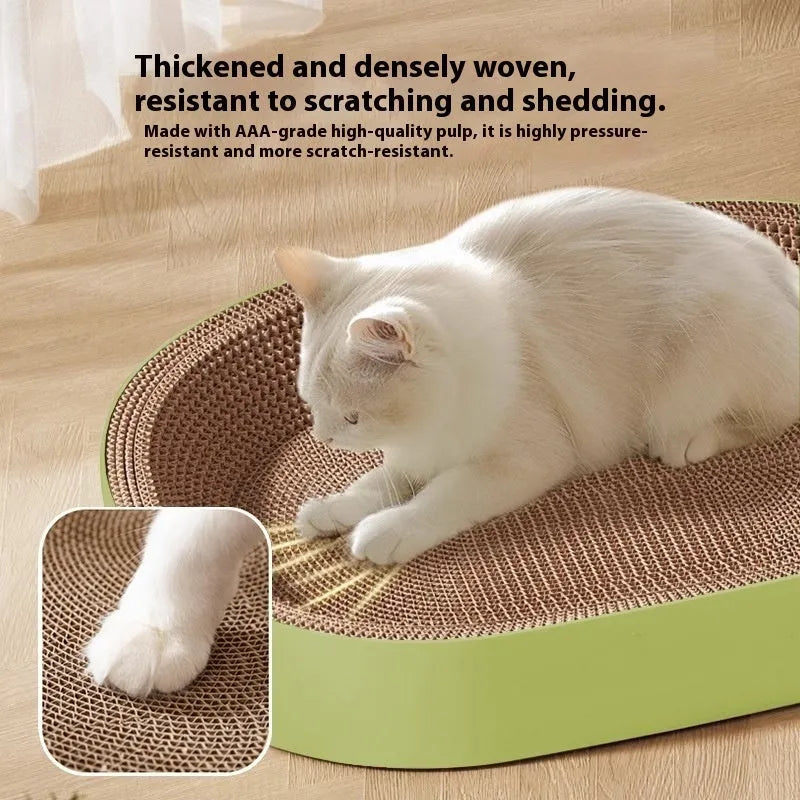 Green oval corrugated paper cat scratch board nest showing textured scratching surface and central bed area.