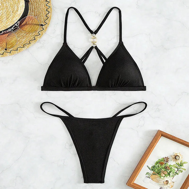 Black women's two-piece bikini with hollow backless top and high-cut briefs.