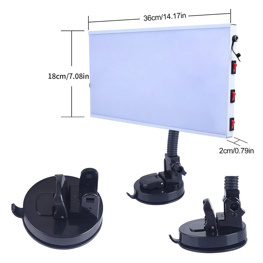 White MPT X009 car dent repair detector suit and concave inspection light on a workbench.