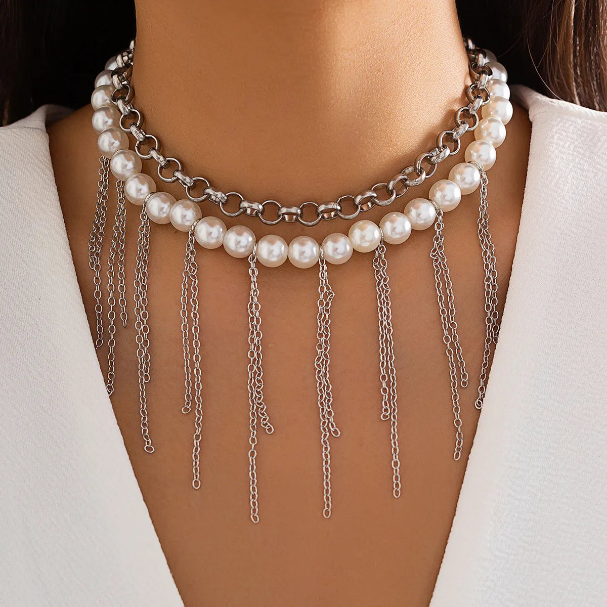 Women's double-layer retro necklace with white K electroplated finish, iron pendant, and imitation pearl tassel design