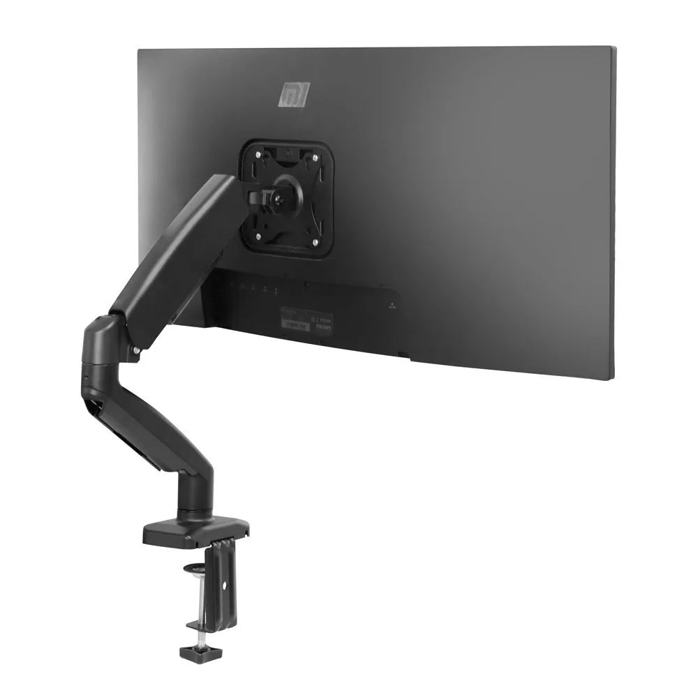 Universal black rotating telescopic LCD monitor stand on a desk next to a keyboard.
