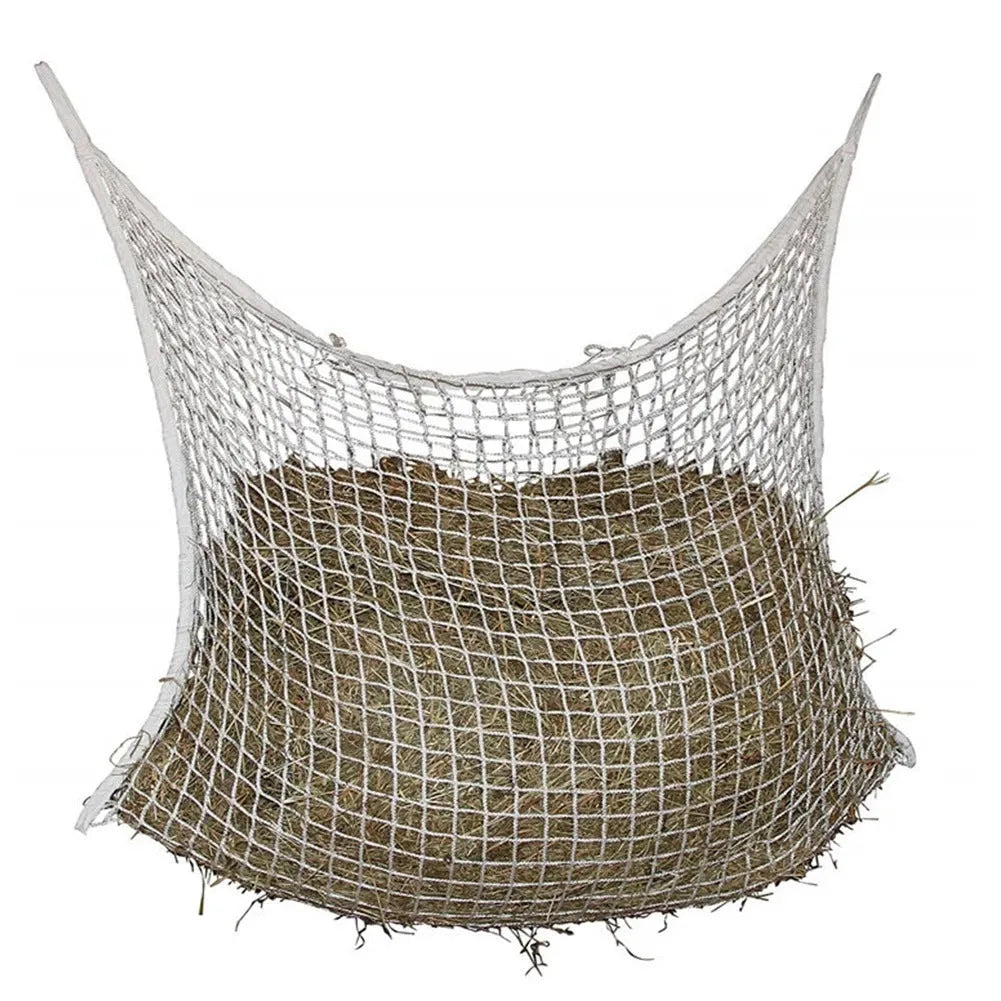 Black woven grid horse feeding bag hanging, showing size options for cattle, horses and sheep.