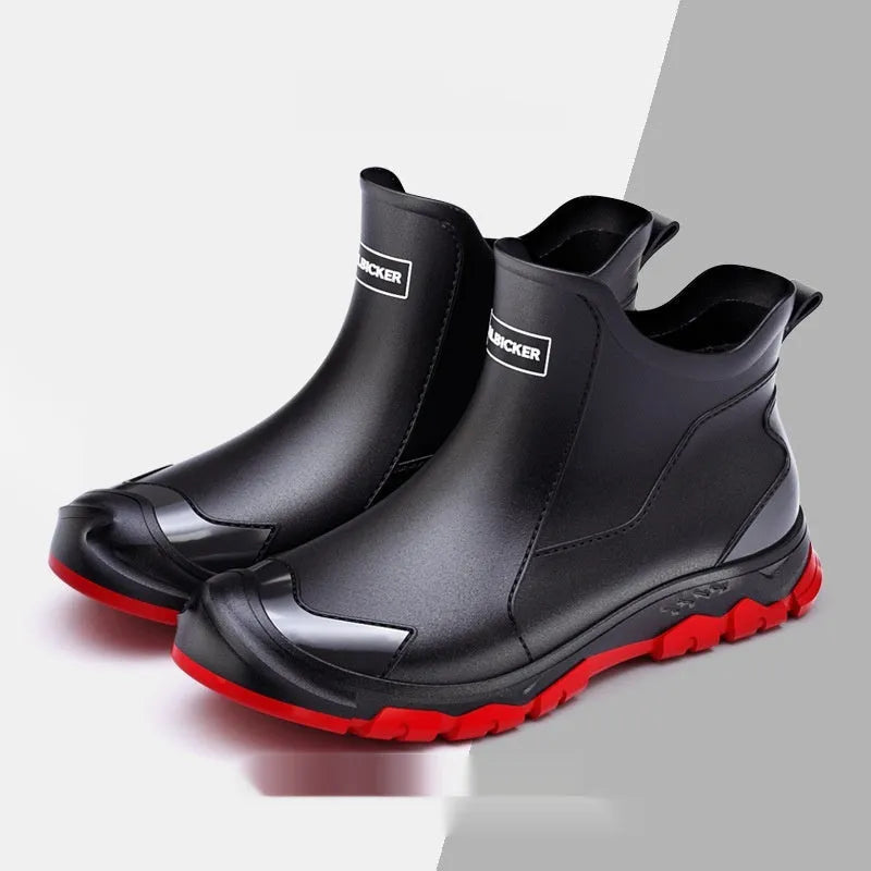 Low-cut short tube rubber rain boots in black with non-slip plastic soles.