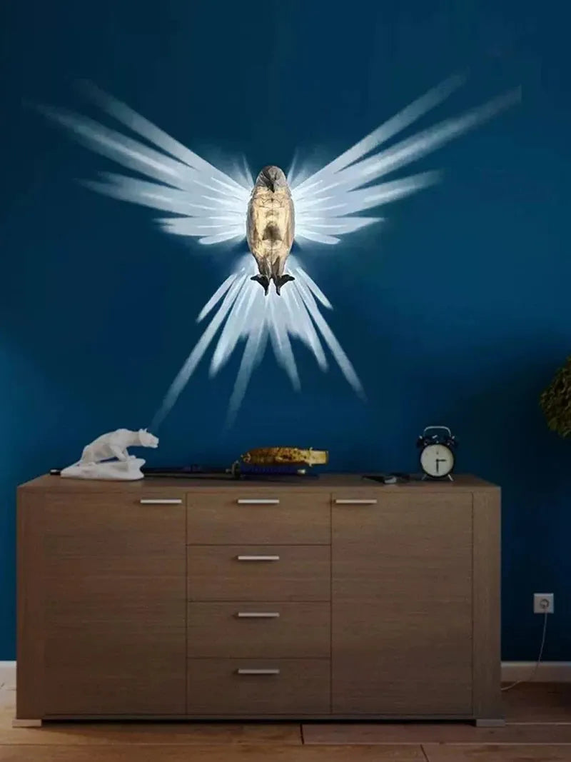 3D printed plastic eagle wall lamp projecting animal silhouette for home decor.