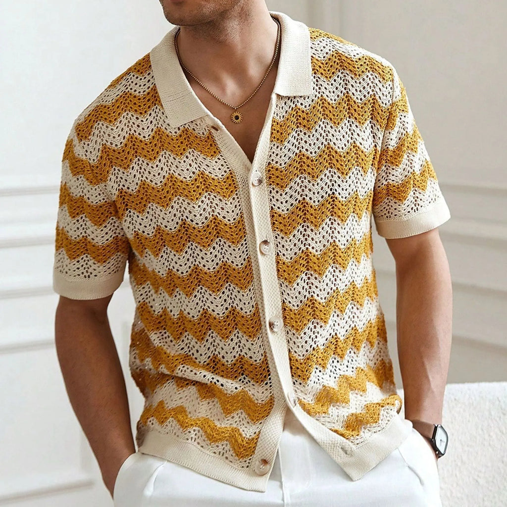 Men's blue short sleeve corrugated sweater with jacquard flocked texture on a hanger.