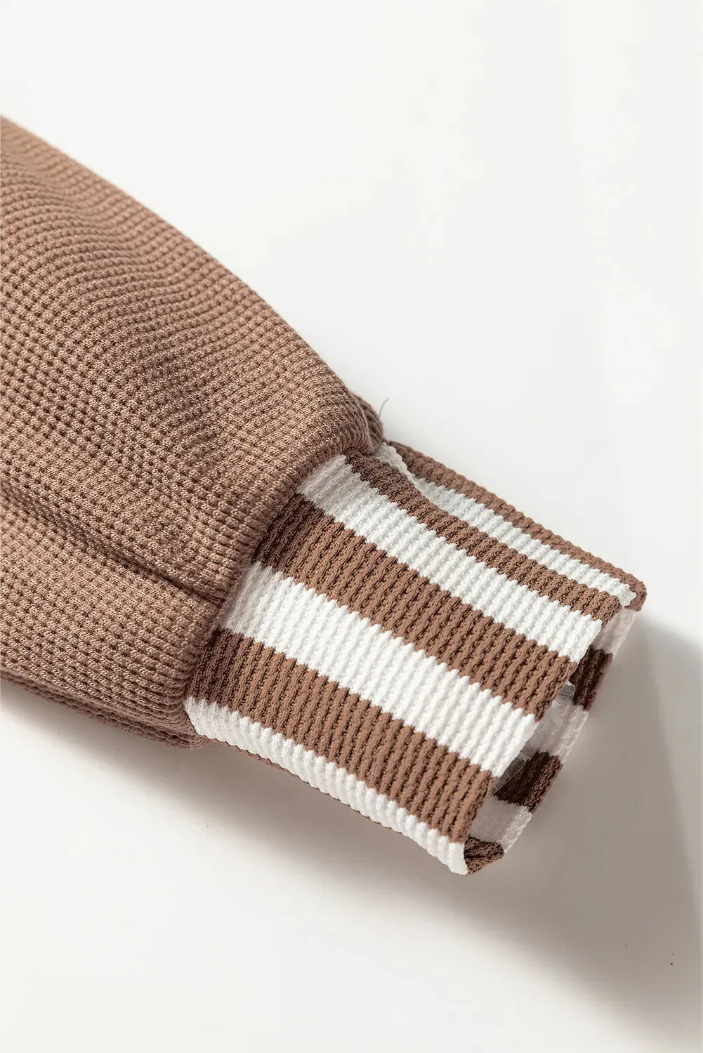Straw yellow waffle texture striped patchwork hoodie with button neck and drawstring.