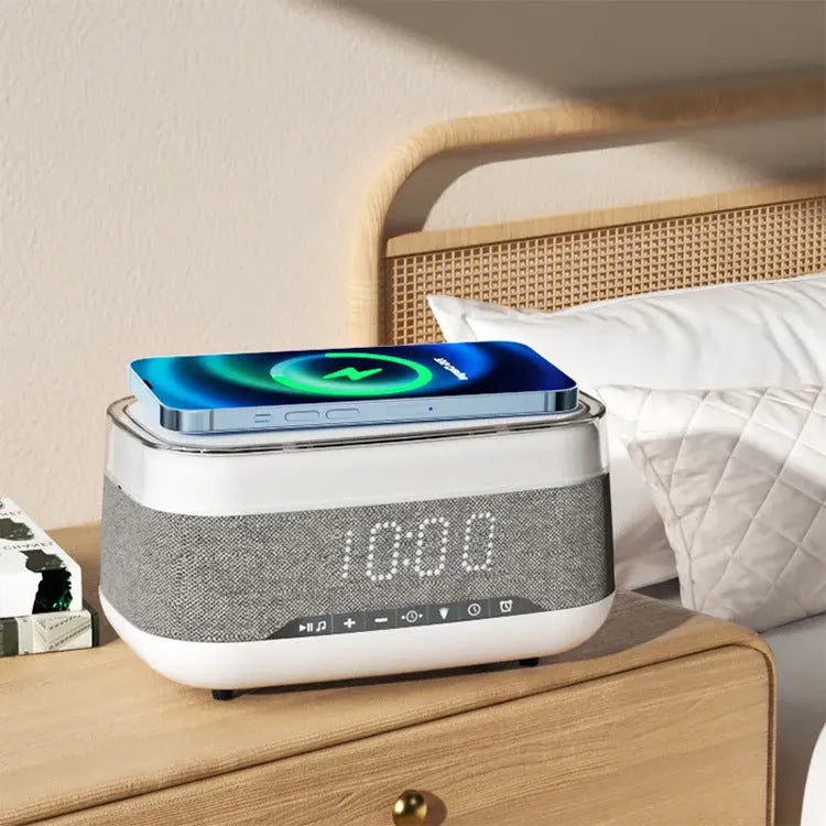 White multifunctional alarm clock with Bluetooth speaker, wireless charging pad, and night light display