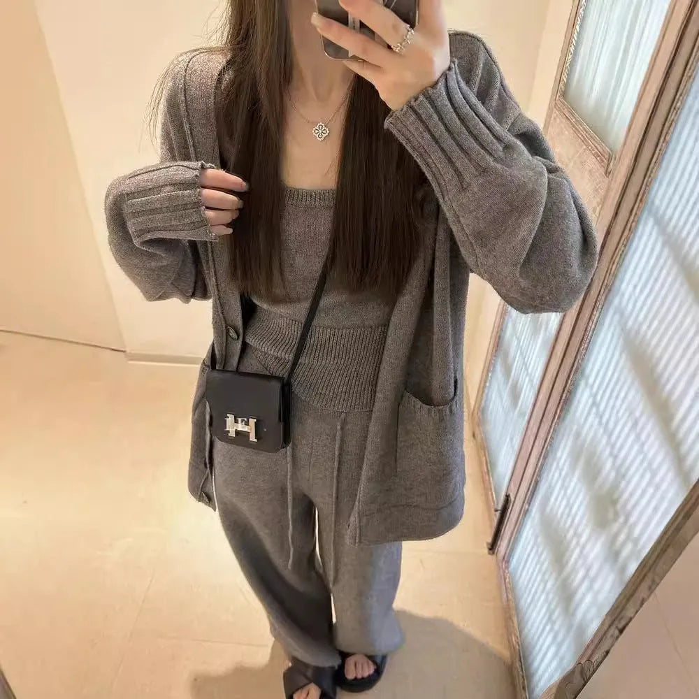 Women's light brown wool blend knit cardigan, vest, and loose pants three-piece casual set.