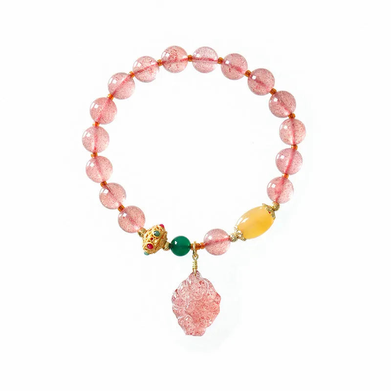 Women's crystal bracelet with strawberry quartz beads in nine tail fox design