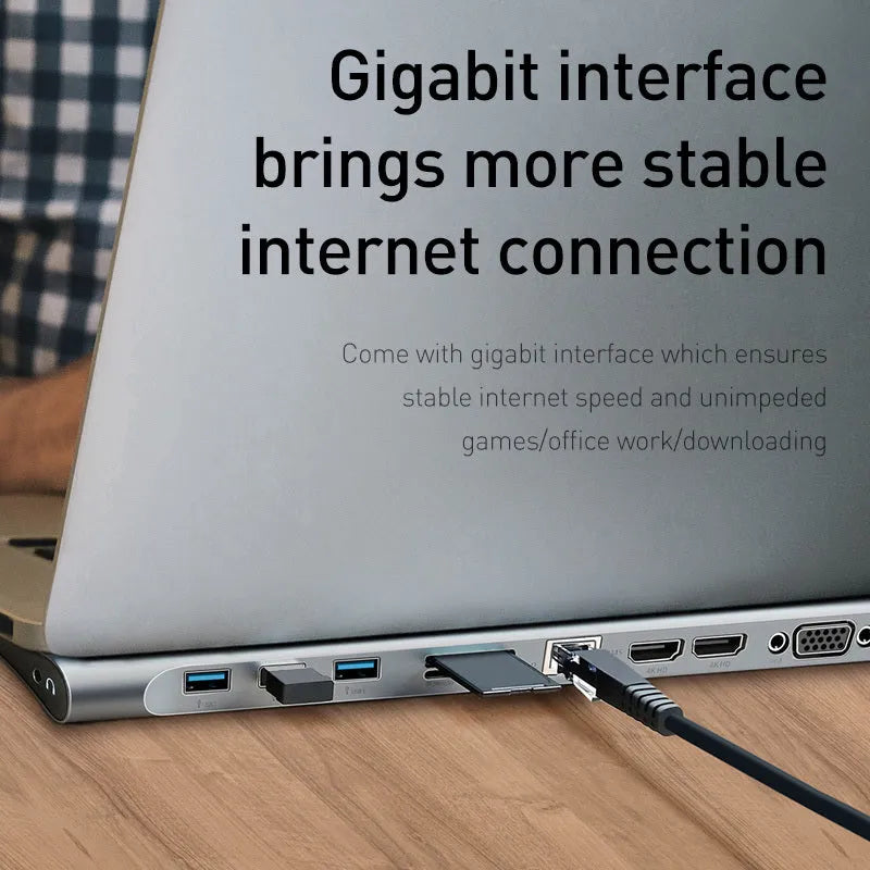Grey 10-port aluminium docking station with cooling bracket showing HDMI, VGA, and USB connections
