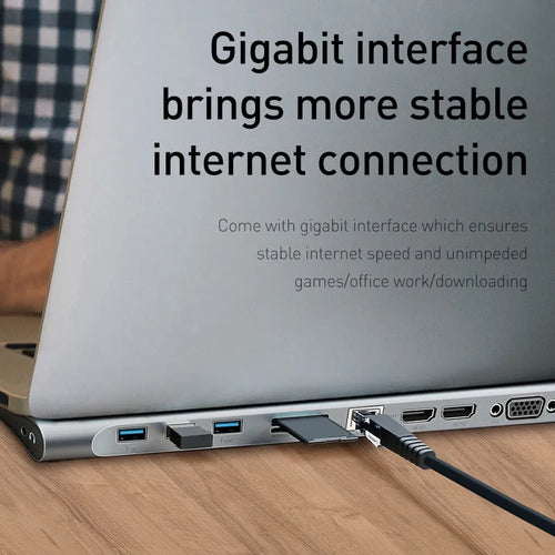 Grey 10-port aluminium docking station with cooling bracket showing HDMI, VGA, and USB connections