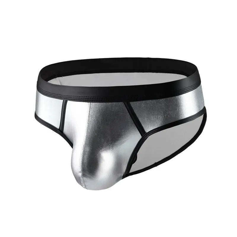 Gold metallic men's swim briefs with low waist and body-shaping design on a mannequin.