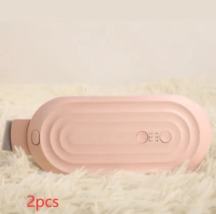 Pink electric menstrual heating pad with controller showing temperature display and vibration settings