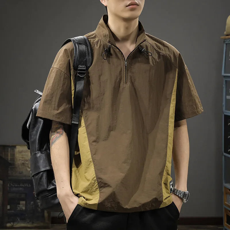 Man wearing a brown half-zip stand collar casual shirt made from ice silk fabric.