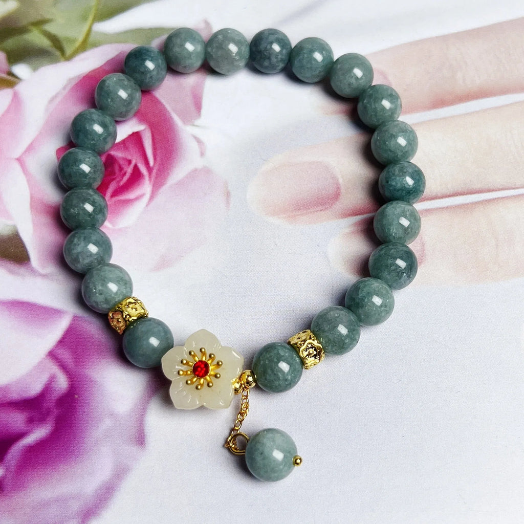 Women's adjustable jade bracelet with retro style and rope closure on wrist