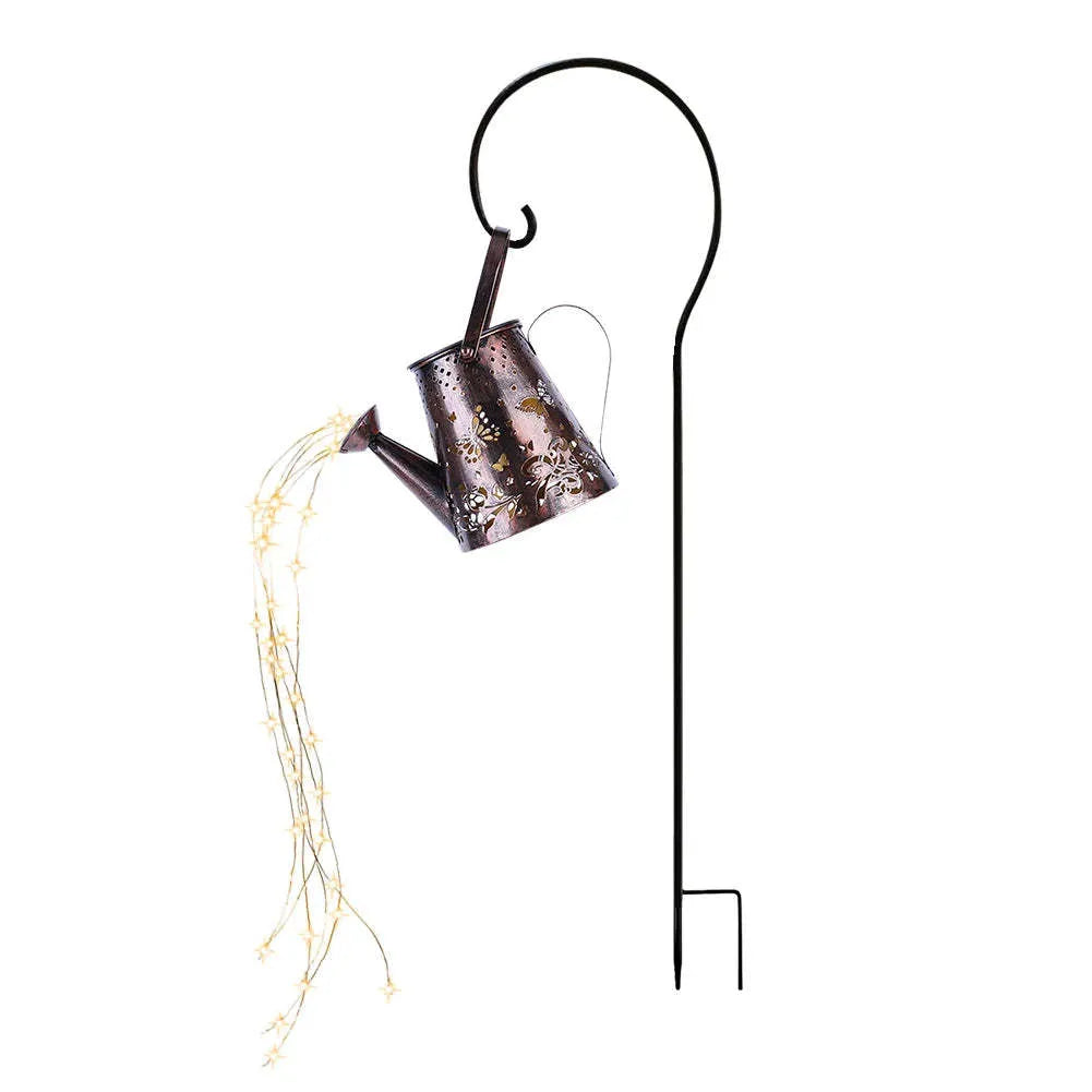 Solar garden lamp with iron tapered butterfly design emitting warm white LED light