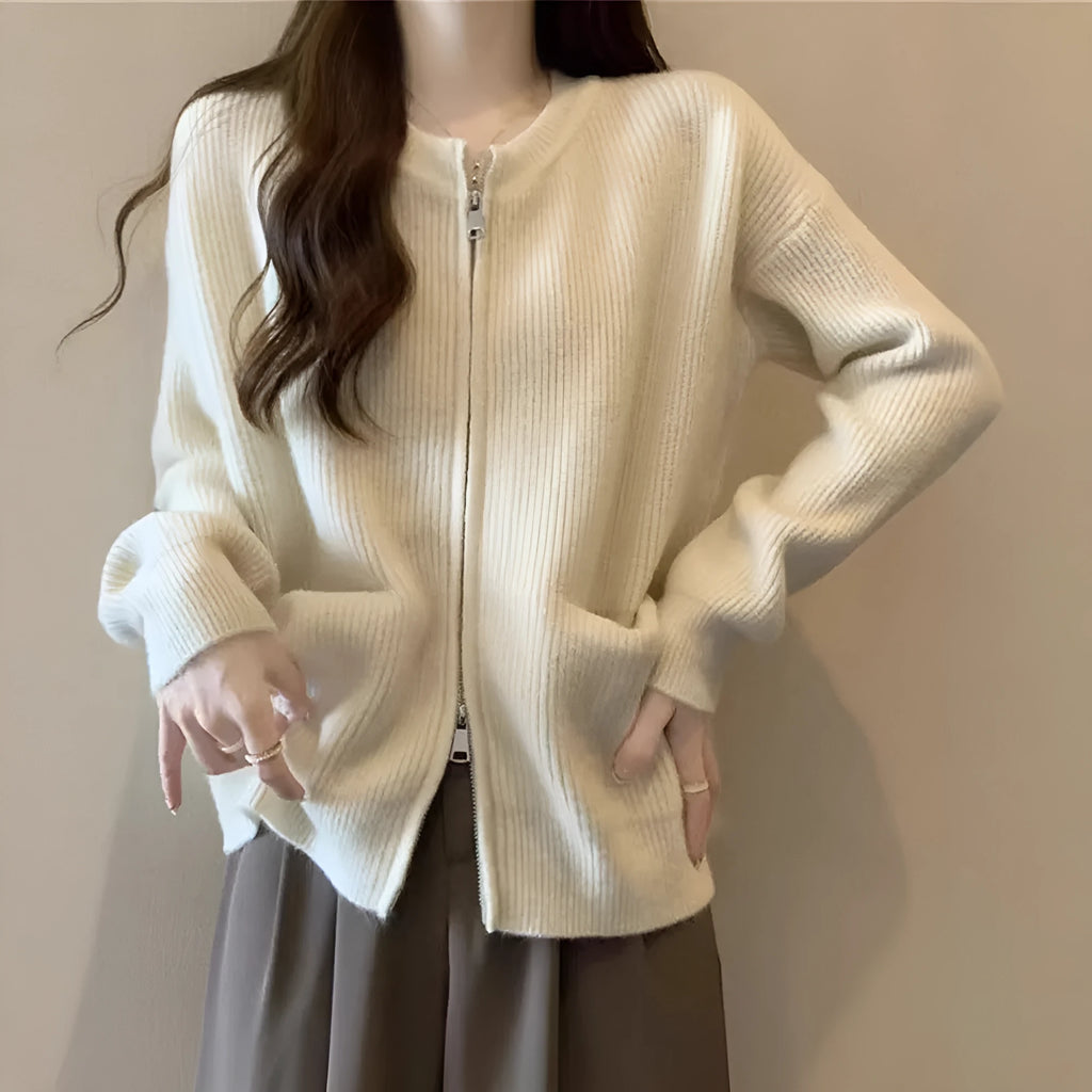 Beige viscose fibre soft sweater coat with long sleeves and open cardigan front.