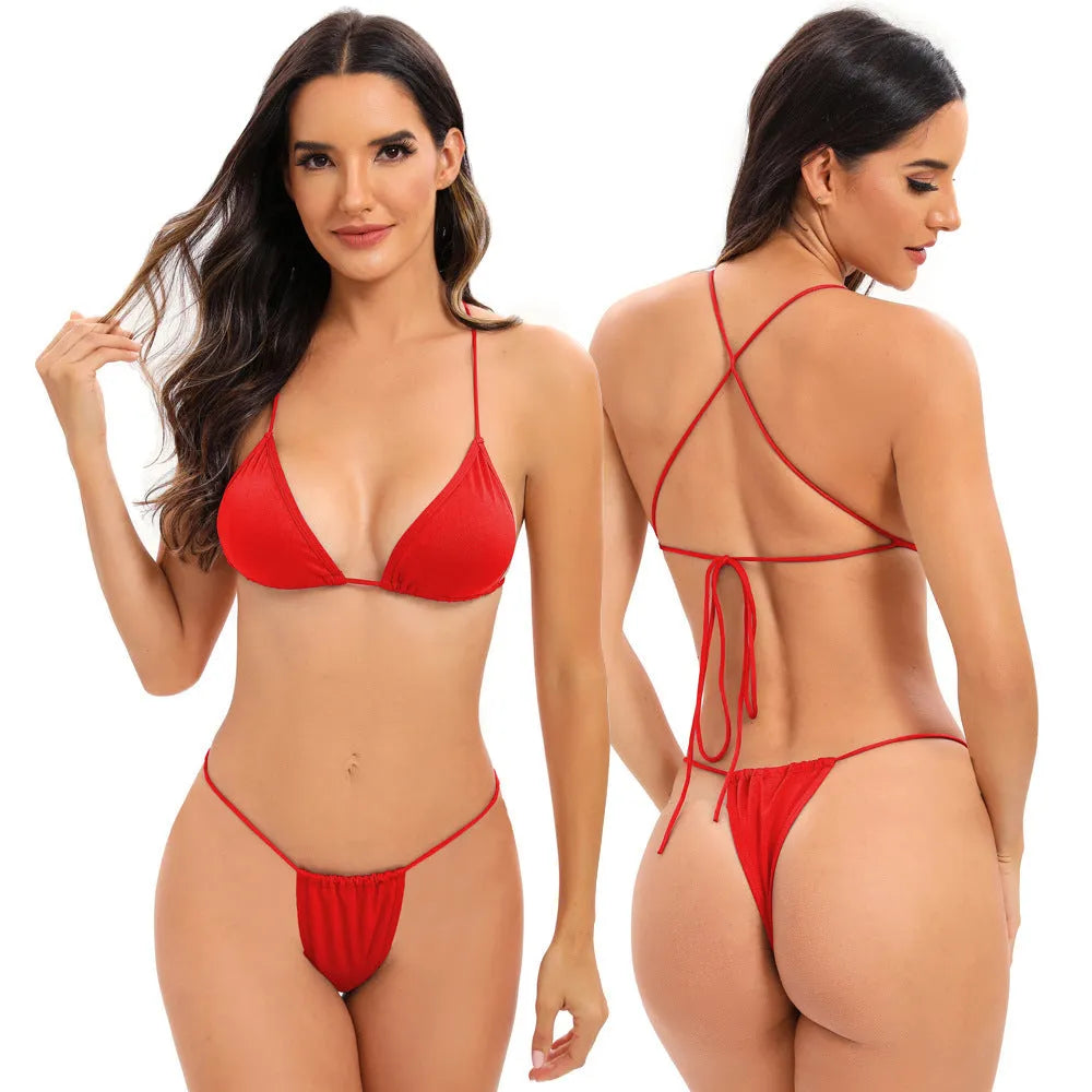 Women's candy coloured cross strap bikini swimsuit on a mannequin, showing the multi-strap design on the briefs.