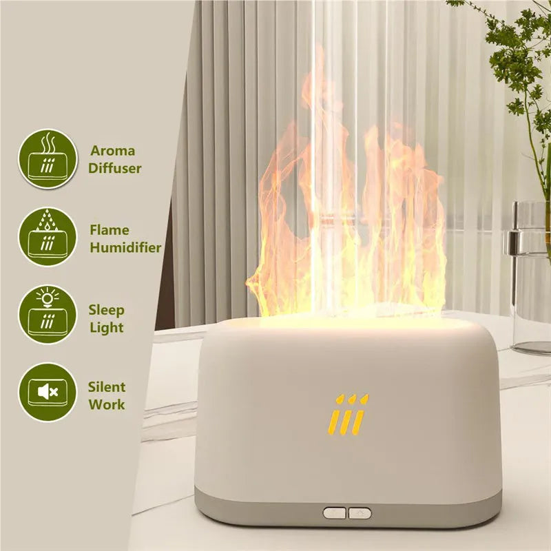 Black and white flame aroma diffuser humidifier with LED lights and remote control on a table.