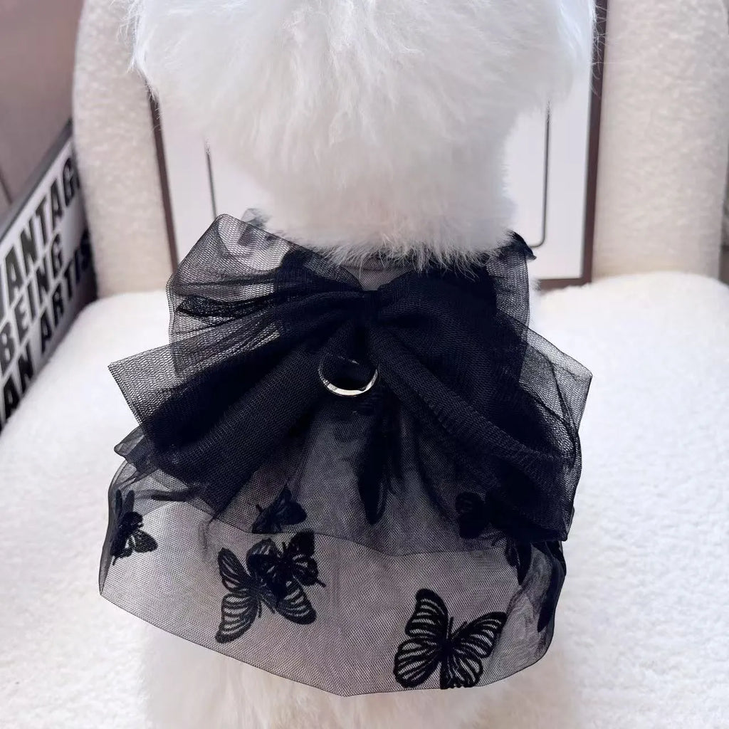 Black gauze tulle princess skirt costume on a small dog, showing the layered skirt and fitted bodice.